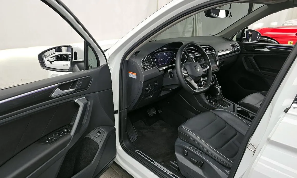 Volkswagen Tiguan — фото 8