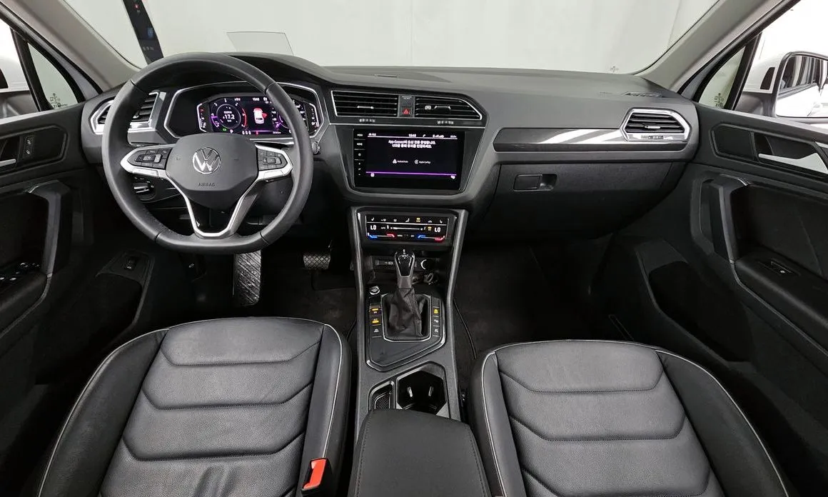 Volkswagen Tiguan — фото 9
