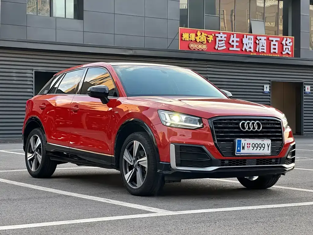 Audi Q2L — фото 5