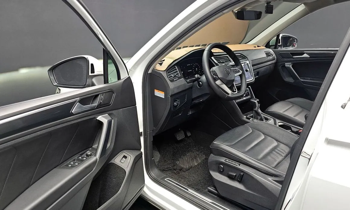 Volkswagen Tiguan — фото 7