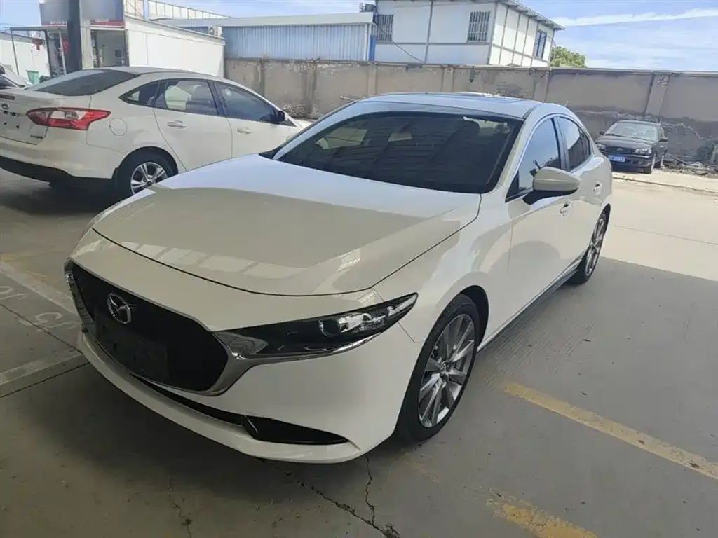 Mazda 3 Axela — фото 1