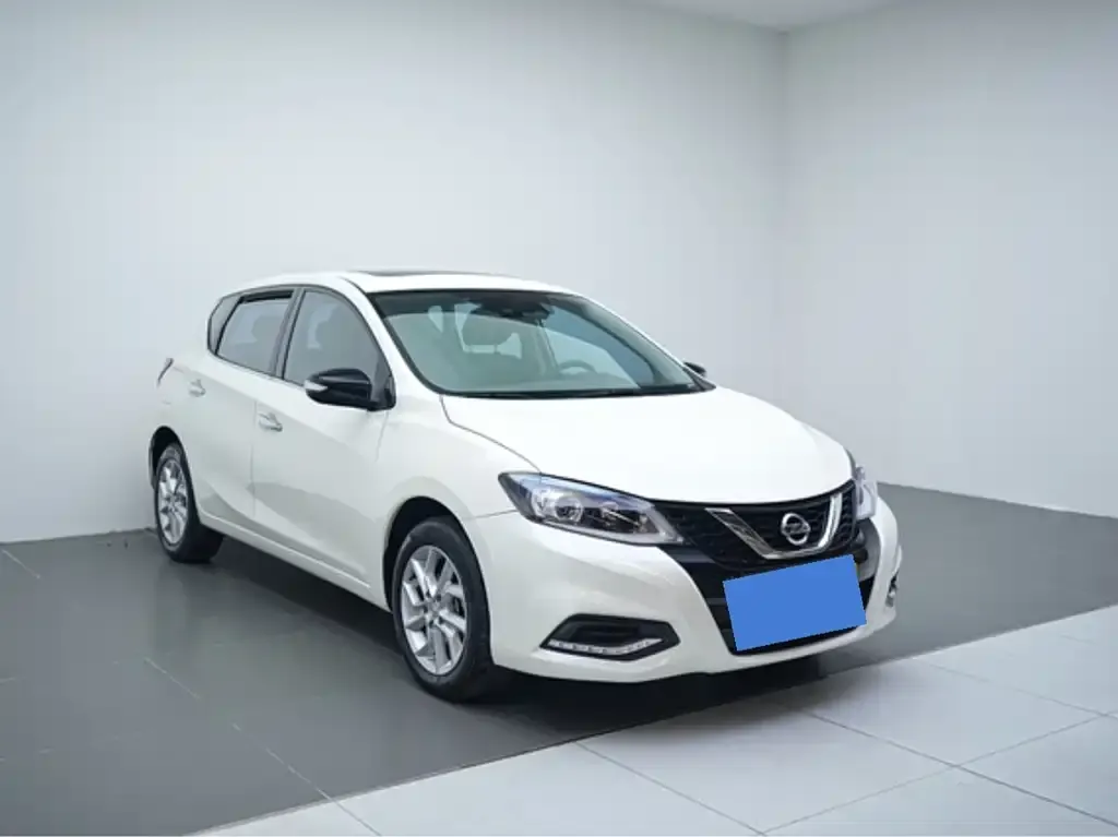 Nissan Tiida — фото 9