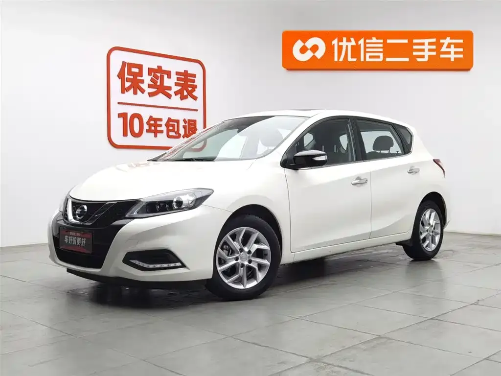Nissan Tiida — фото 1