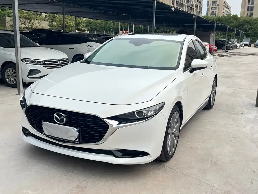 Mazda 3 Axela — фото 1