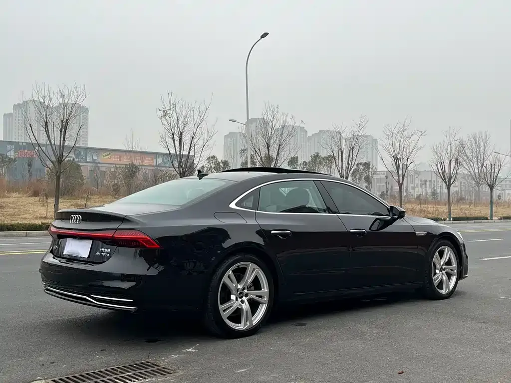 Audi A7L — фото 9