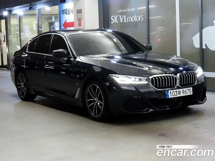 BMW 5-Series — фото 1