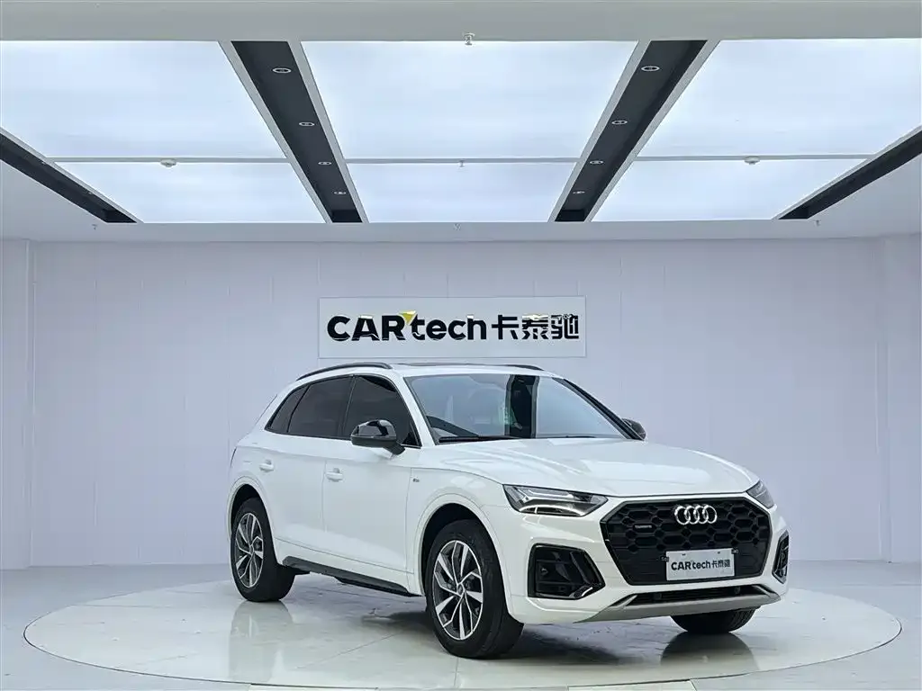 Audi Q5L — фото 9