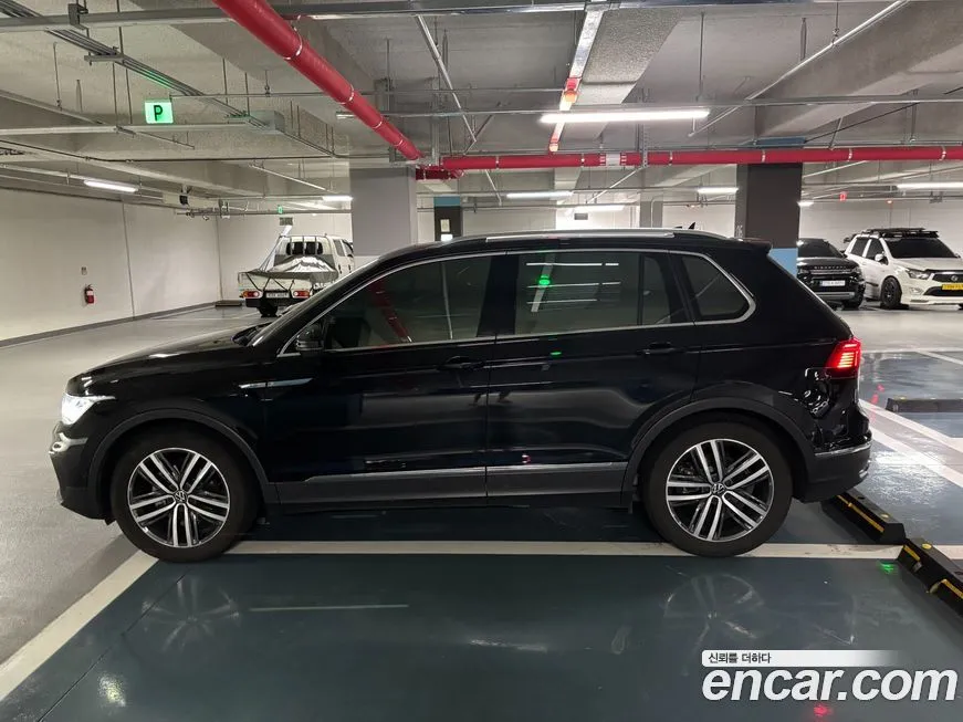 Volkswagen Tiguan — фото 10