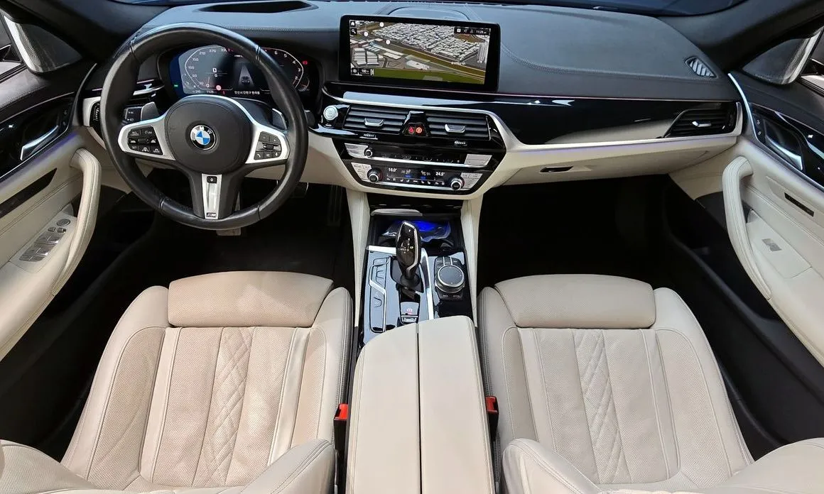 BMW 5-Series — фото 10