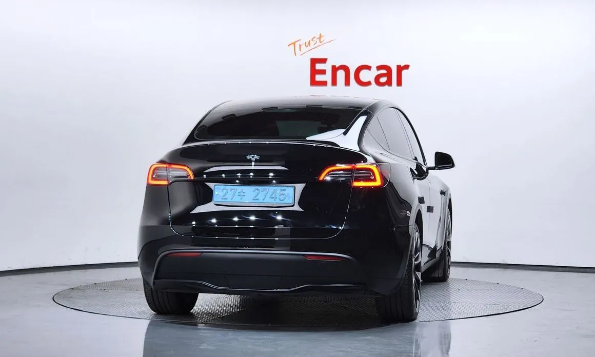 Tesla Model Y — фото 5