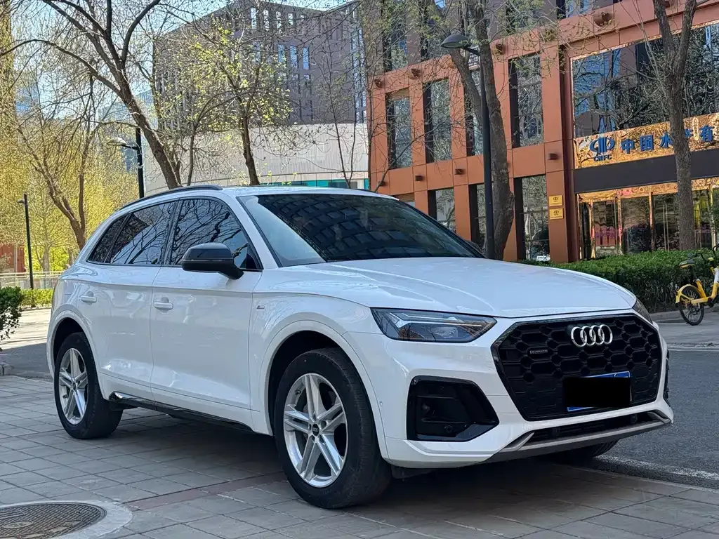 Audi Q5L — фото 7