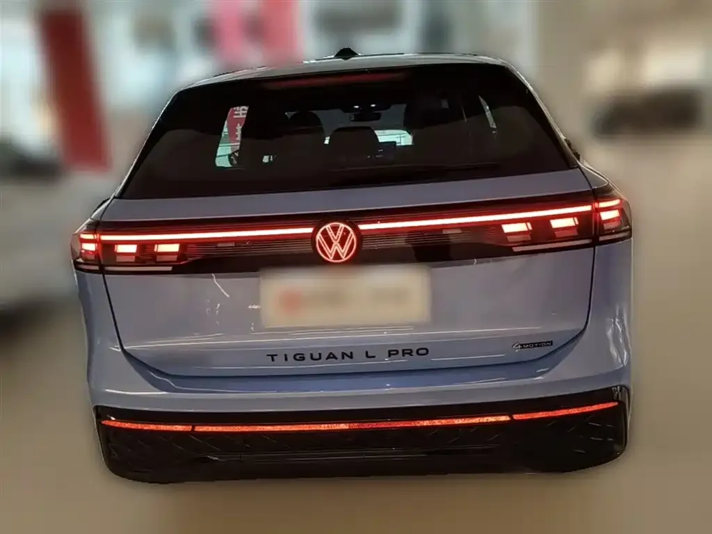 Volkswagen Tiguan L — фото 3