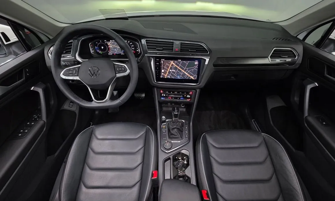 Volkswagen Tiguan — фото 9