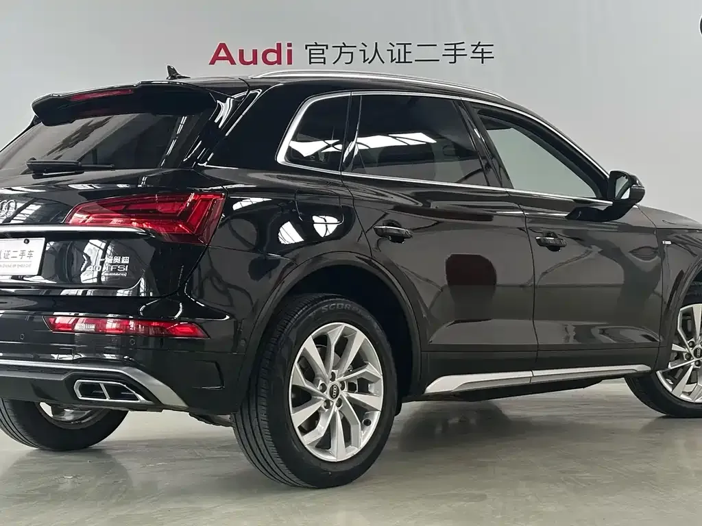 Audi Q5L — фото 5
