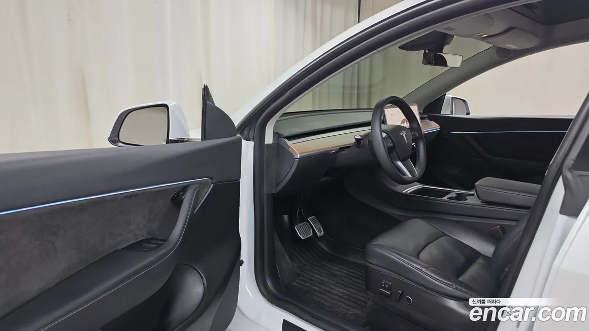 Tesla Model Y — фото 8