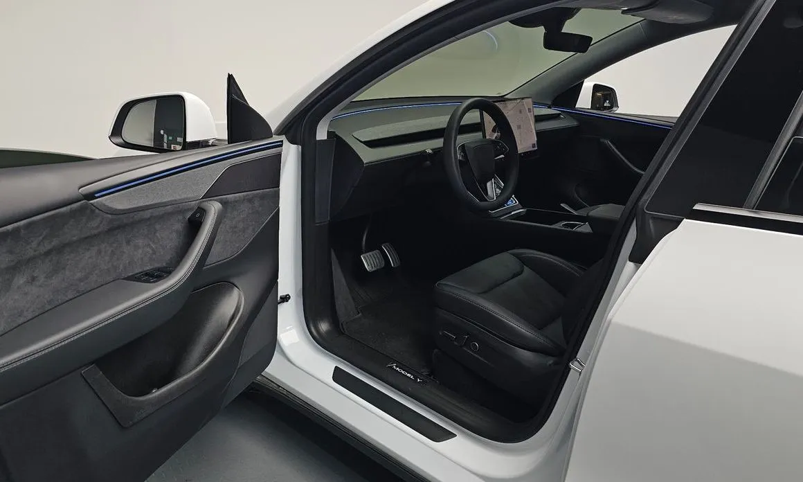 Tesla Model Y — фото 7