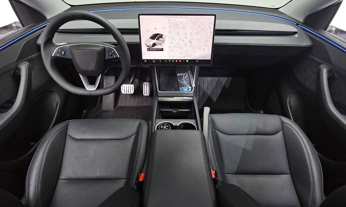 Tesla Model Y — фото 9
