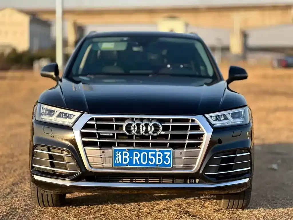 Audi Q5L — фото 5