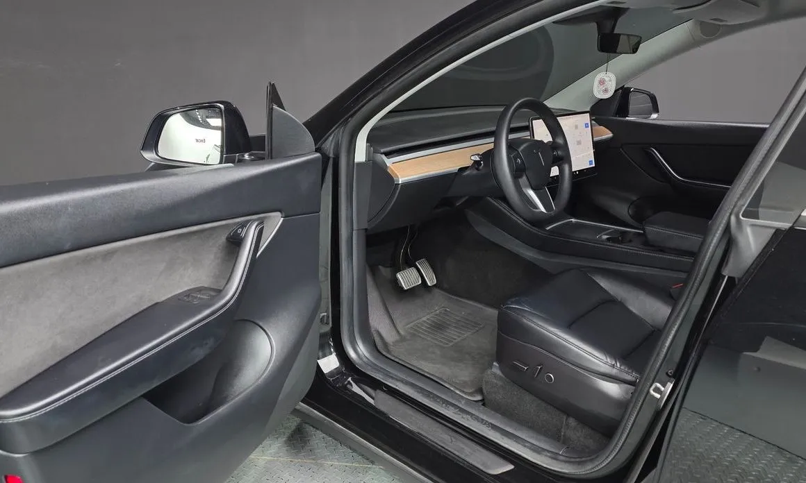 Tesla Model Y — фото 8