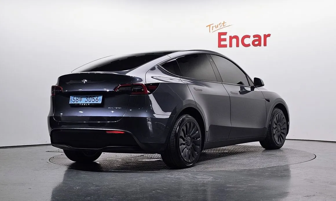 Tesla Model Y — фото 8