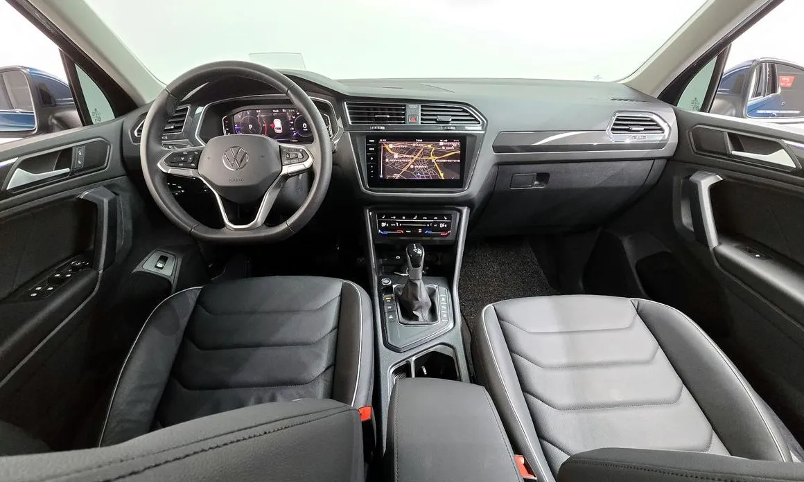 Volkswagen Tiguan — фото 7