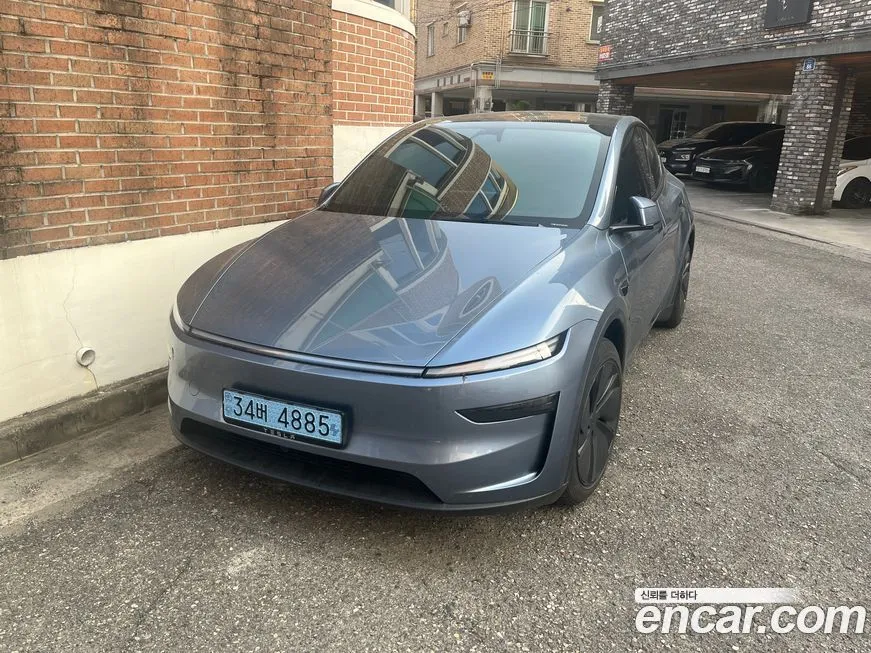 Tesla Model Y — фото 1