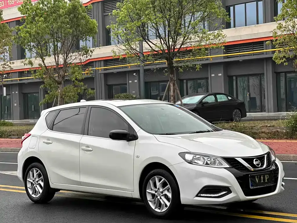Nissan Tiida — фото 9