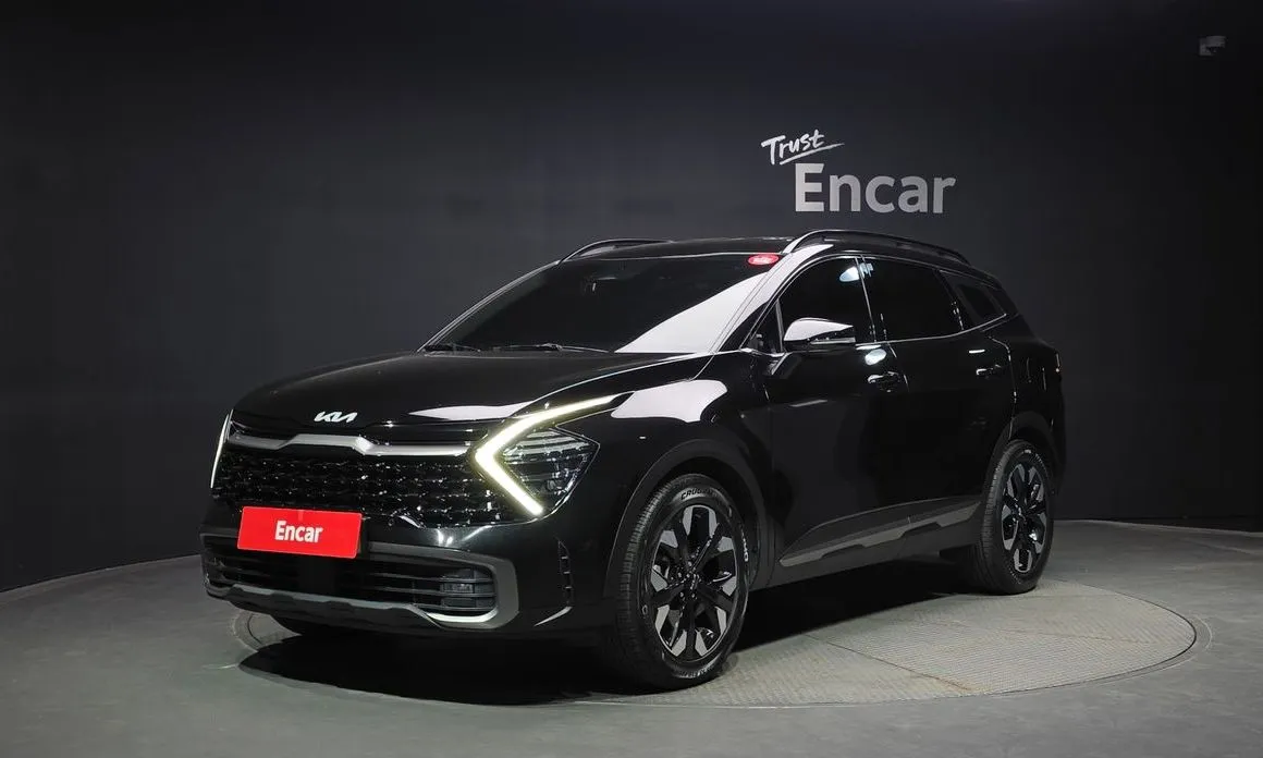Kia Sportage — фото 1