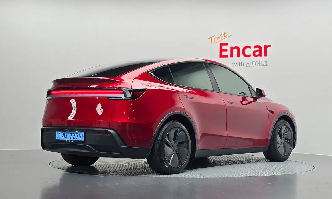 Tesla Model Y — фото 7