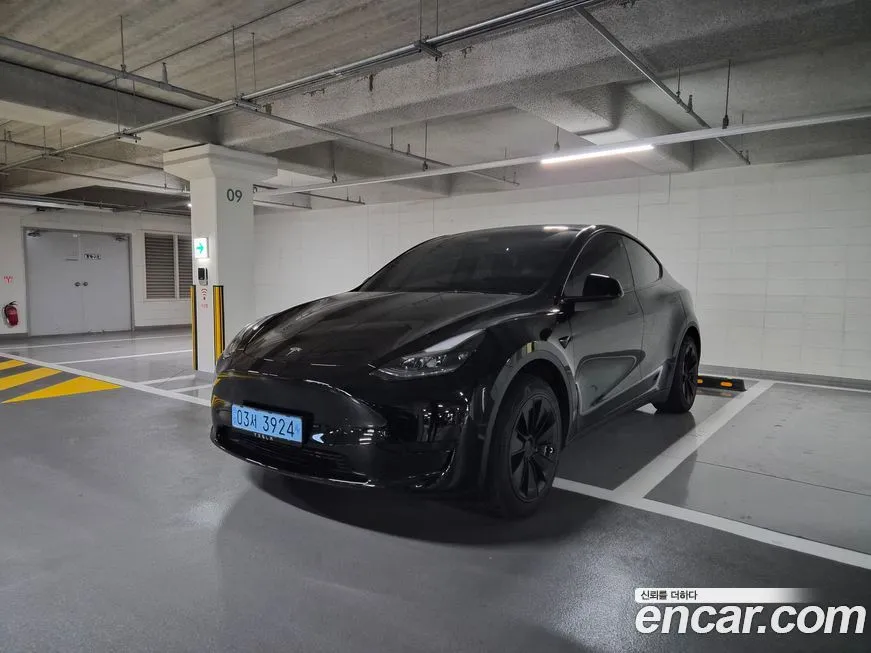 Tesla Model Y — фото 1