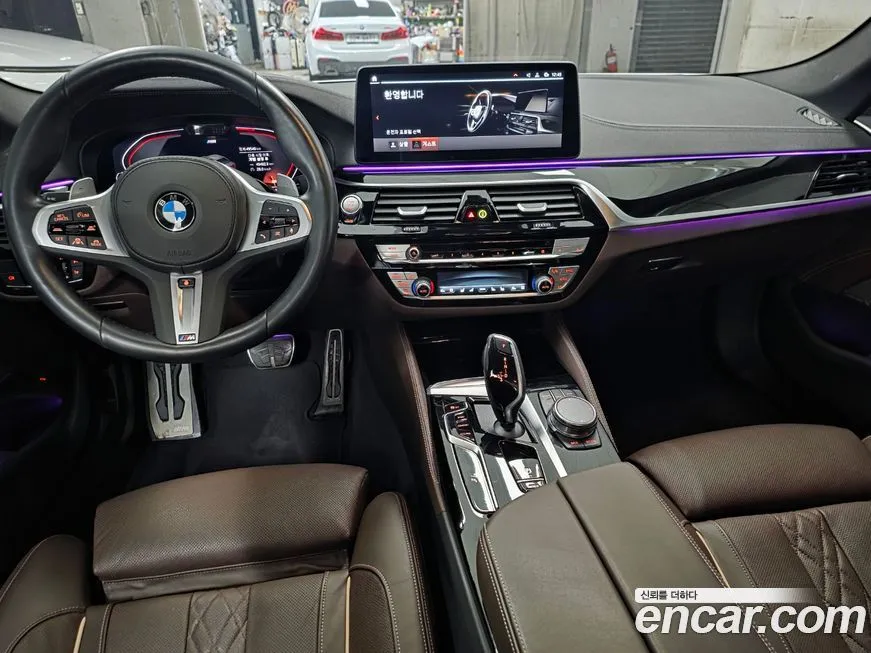 BMW 5-Series — фото 10