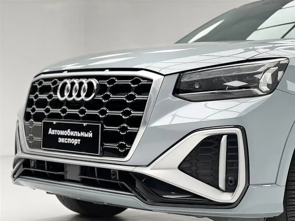 Audi Q2L — фото 9