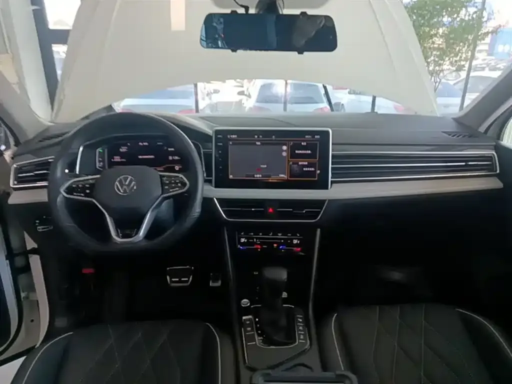 Volkswagen Tiguan L — фото 2