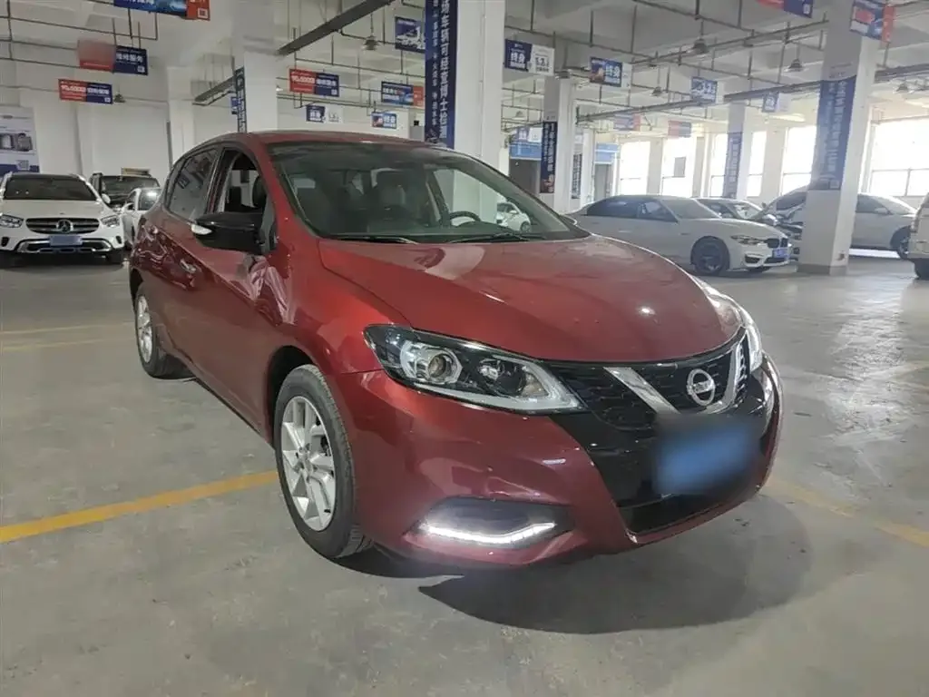 Nissan Tiida — фото 10
