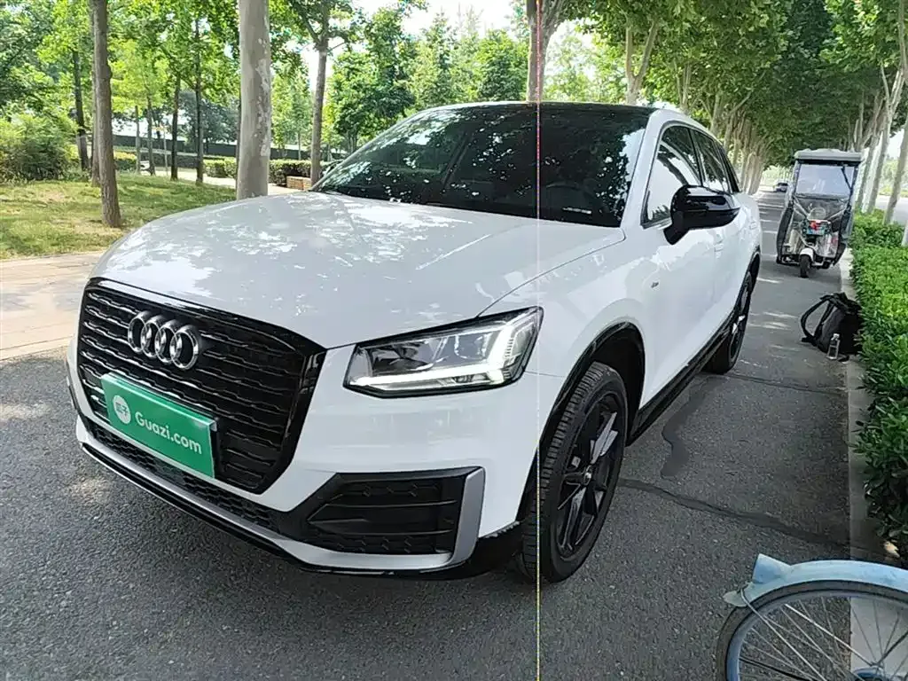 Audi Q2L — фото 10