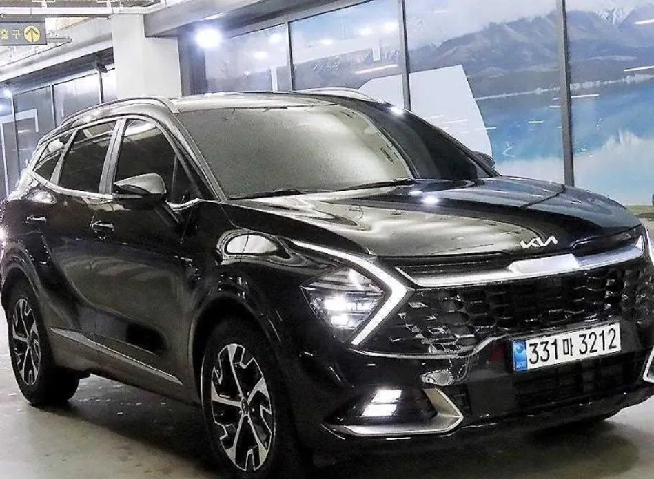 Kia Sportage — фото 1