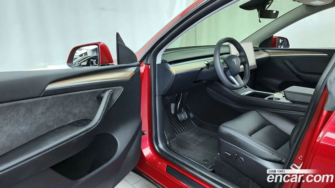 Tesla Model Y — фото 9