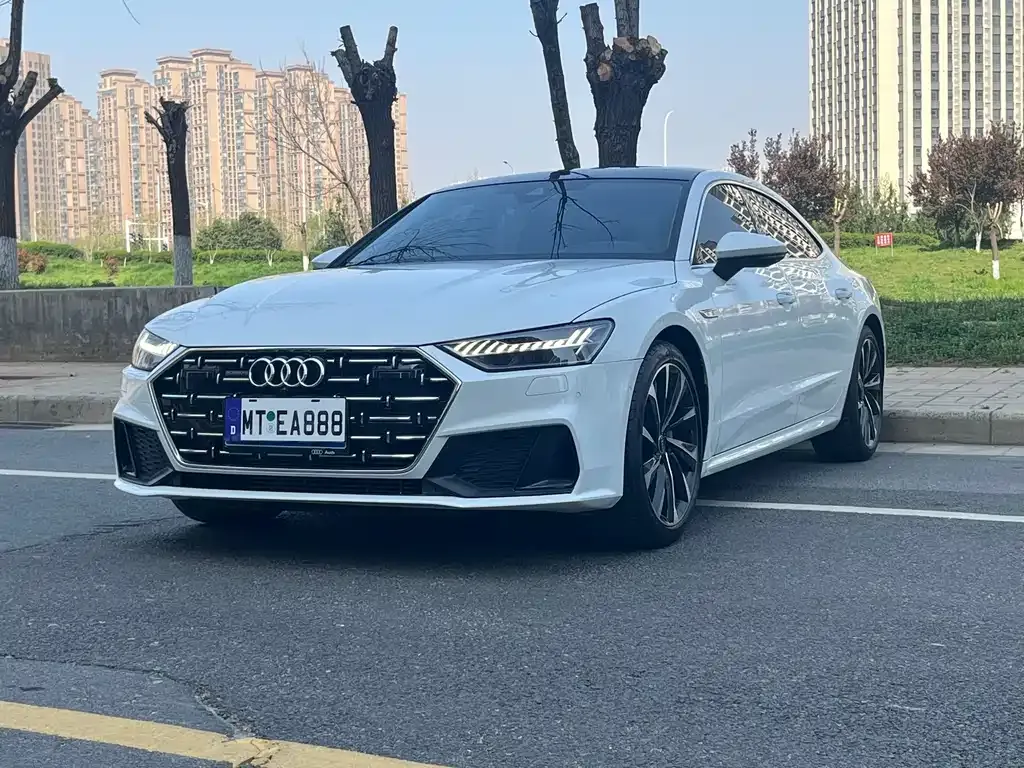 Audi A7L — фото 8