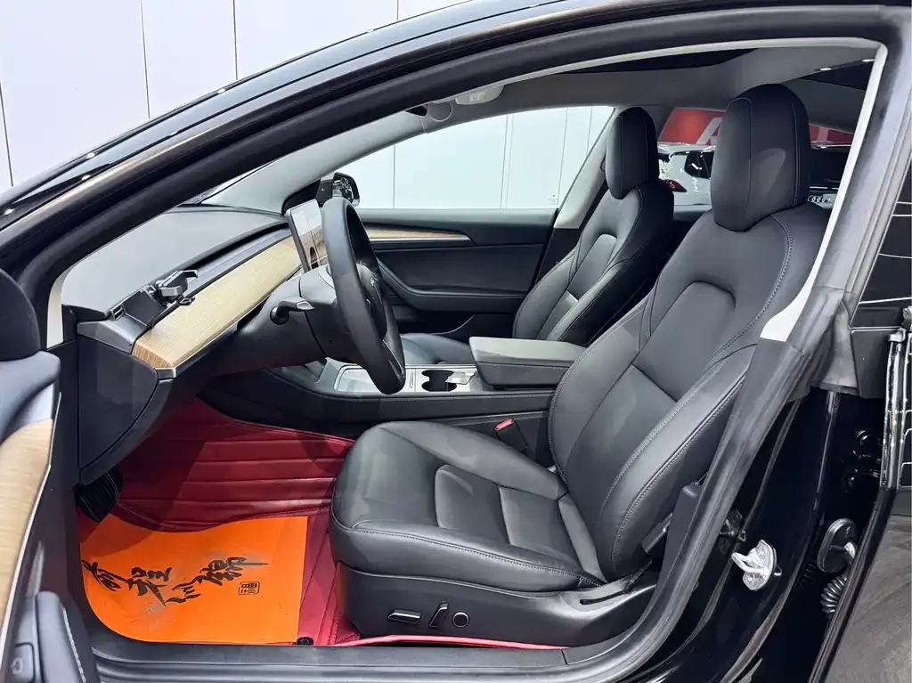 Tesla Model 3 — фото 10