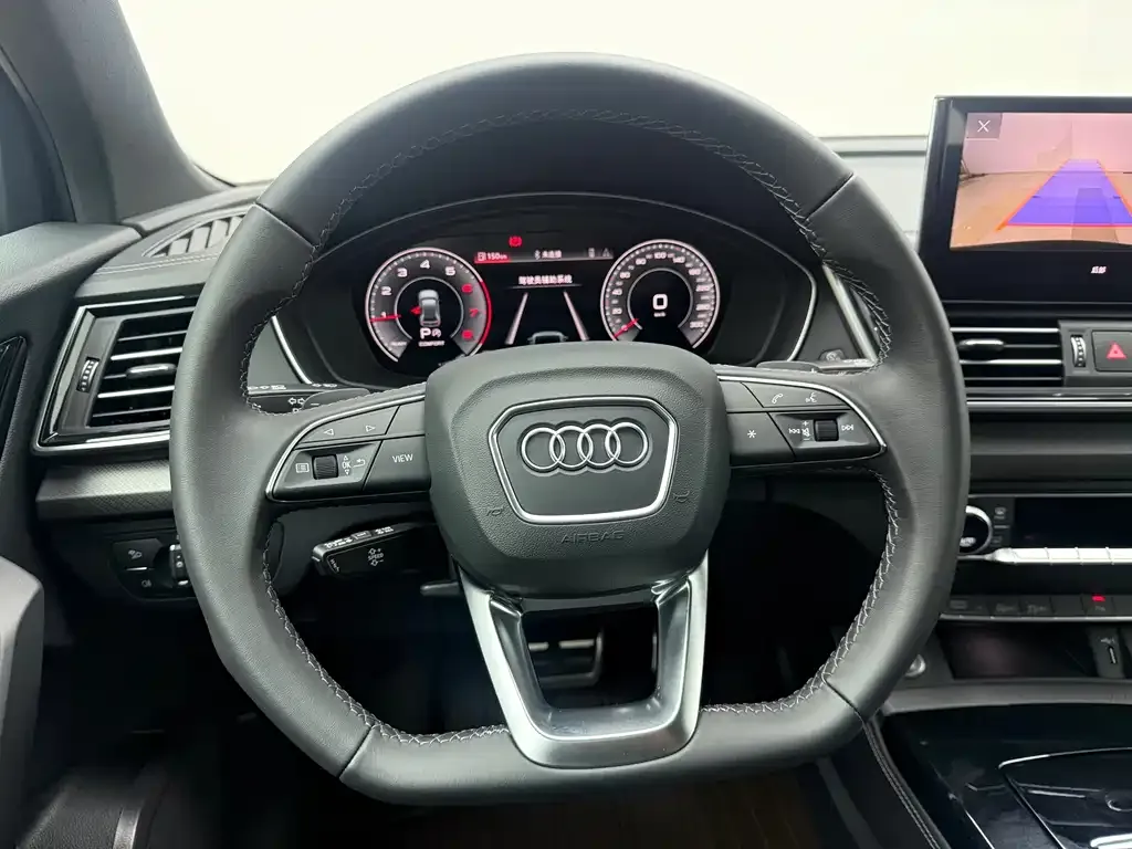 Audi Q5L — фото 10