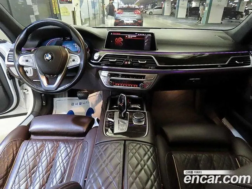 BMW 7-Series — фото 10