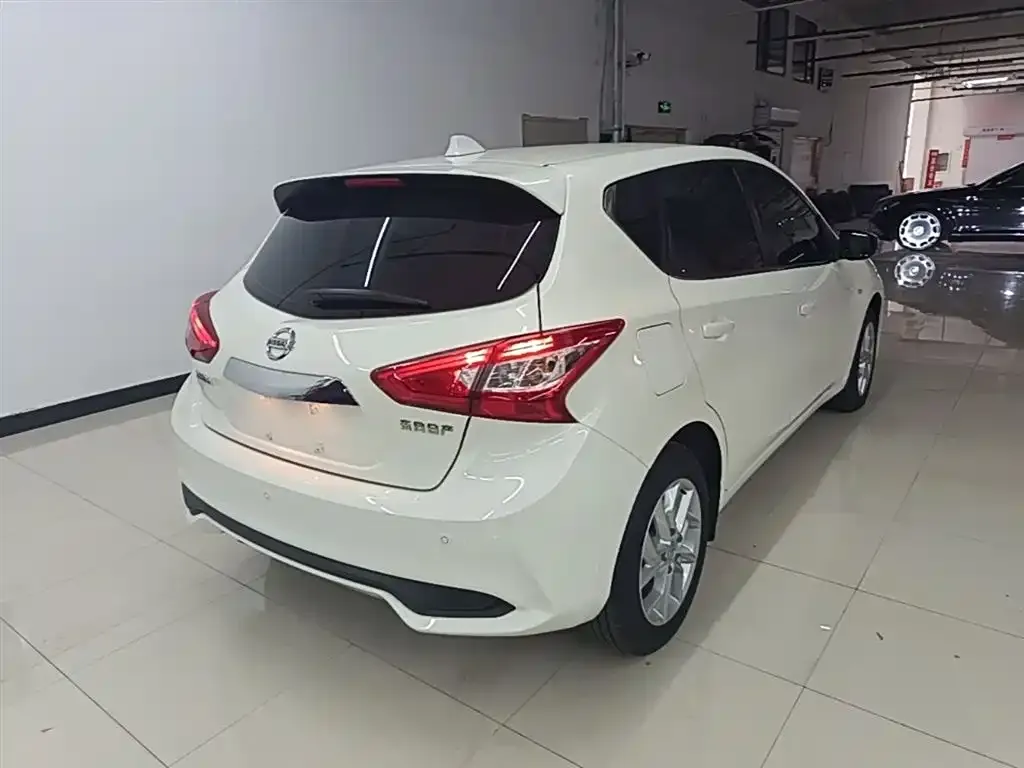 Nissan Tiida — фото 9