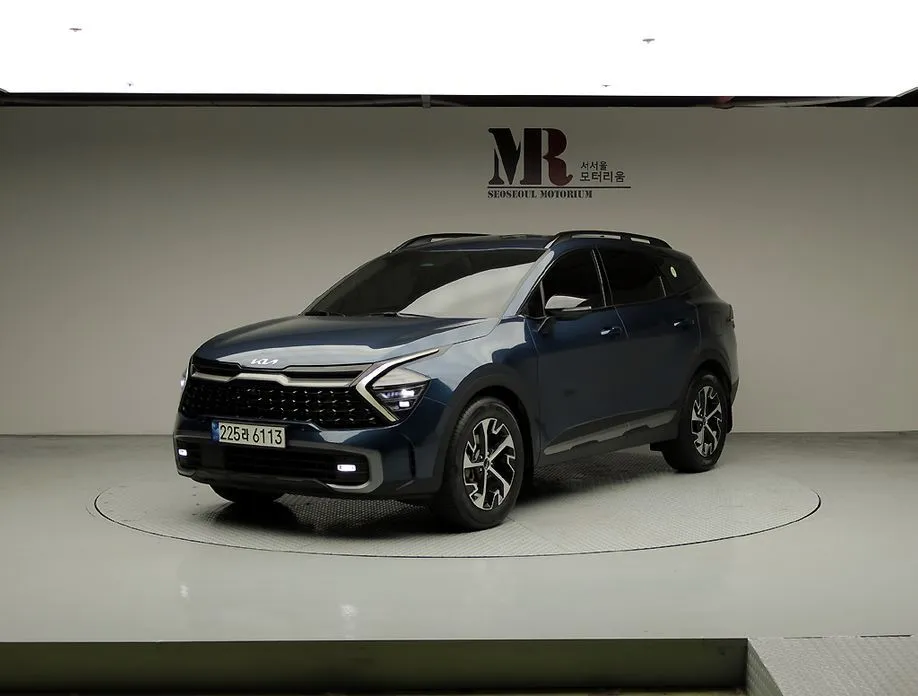 Kia Sportage — фото 1