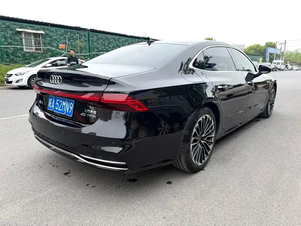 Audi A7L — фото 5
