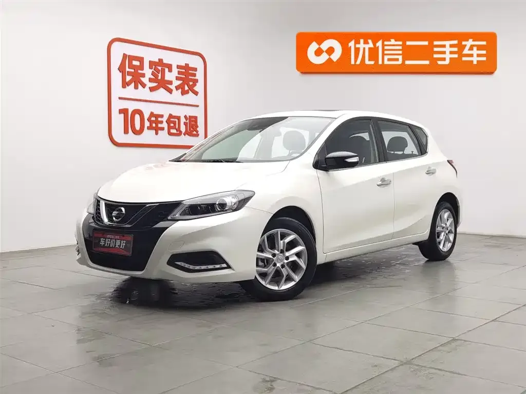 Nissan Tiida — фото 1