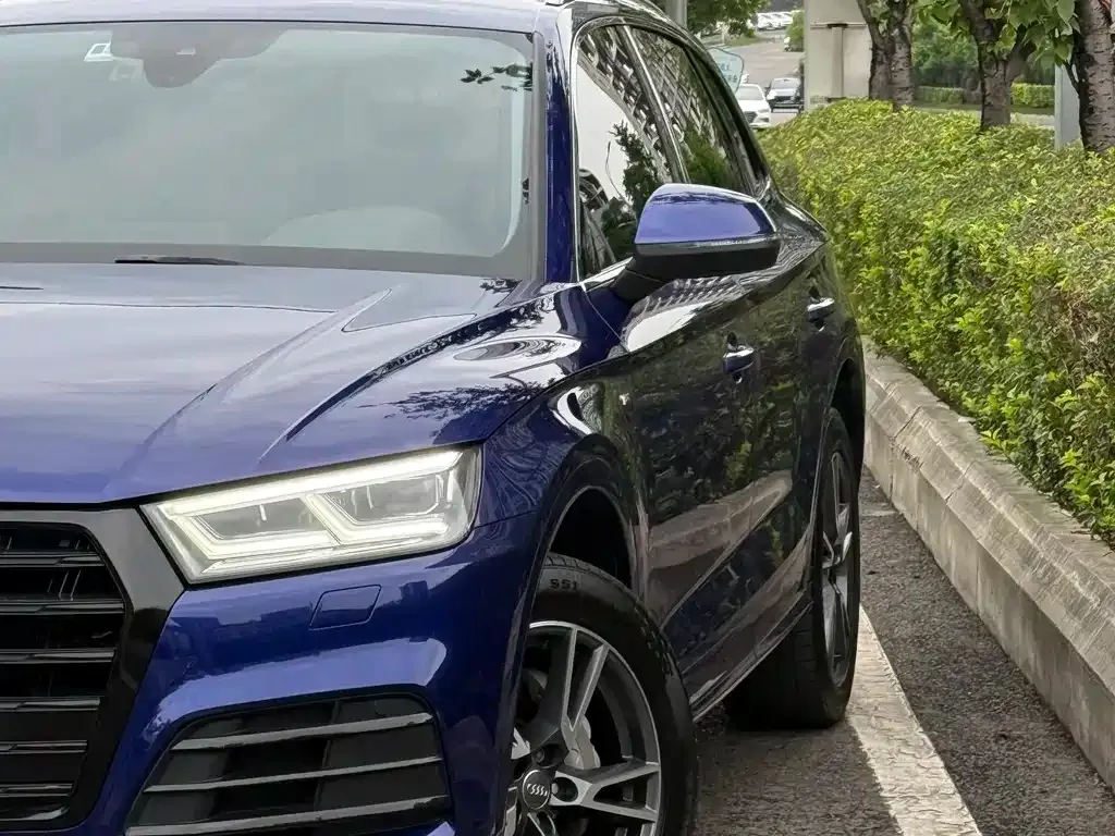 Audi Q5L — фото 9