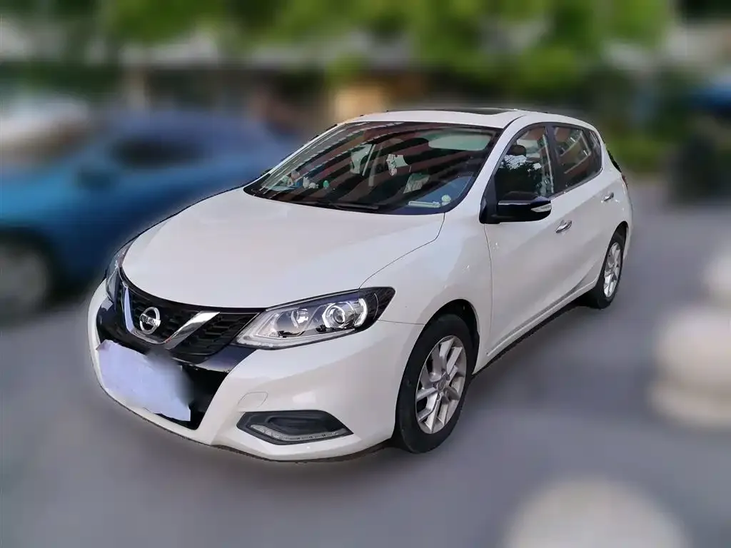 Nissan Tiida — фото 10