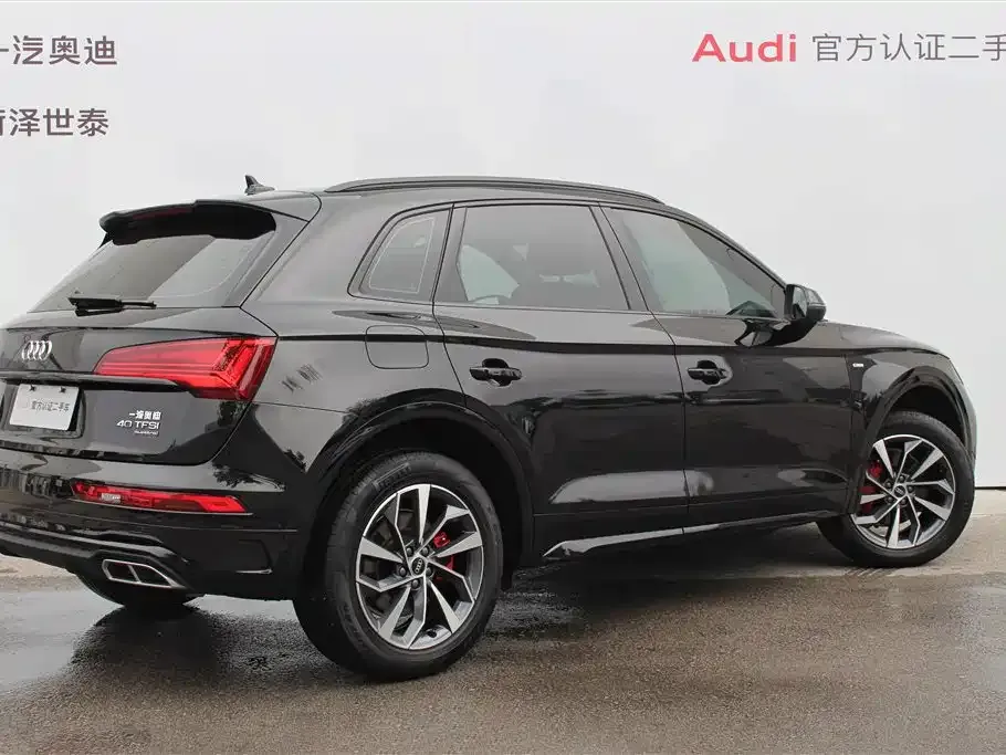 Audi Q5L — фото 10