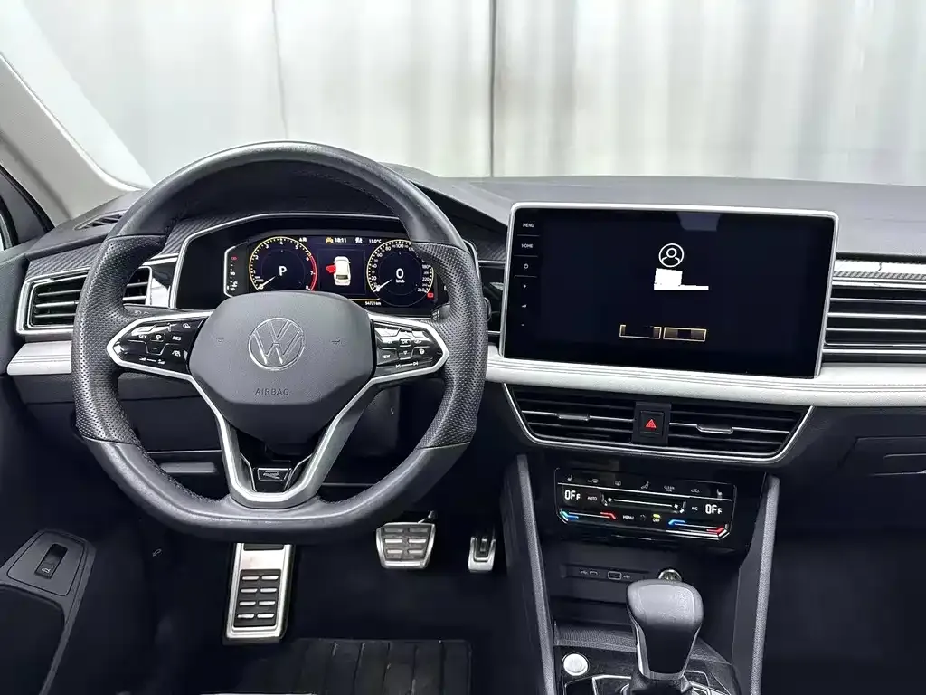 Volkswagen Tiguan L — фото 2