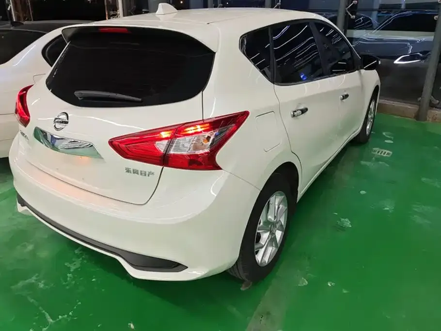Nissan Tiida — фото 3